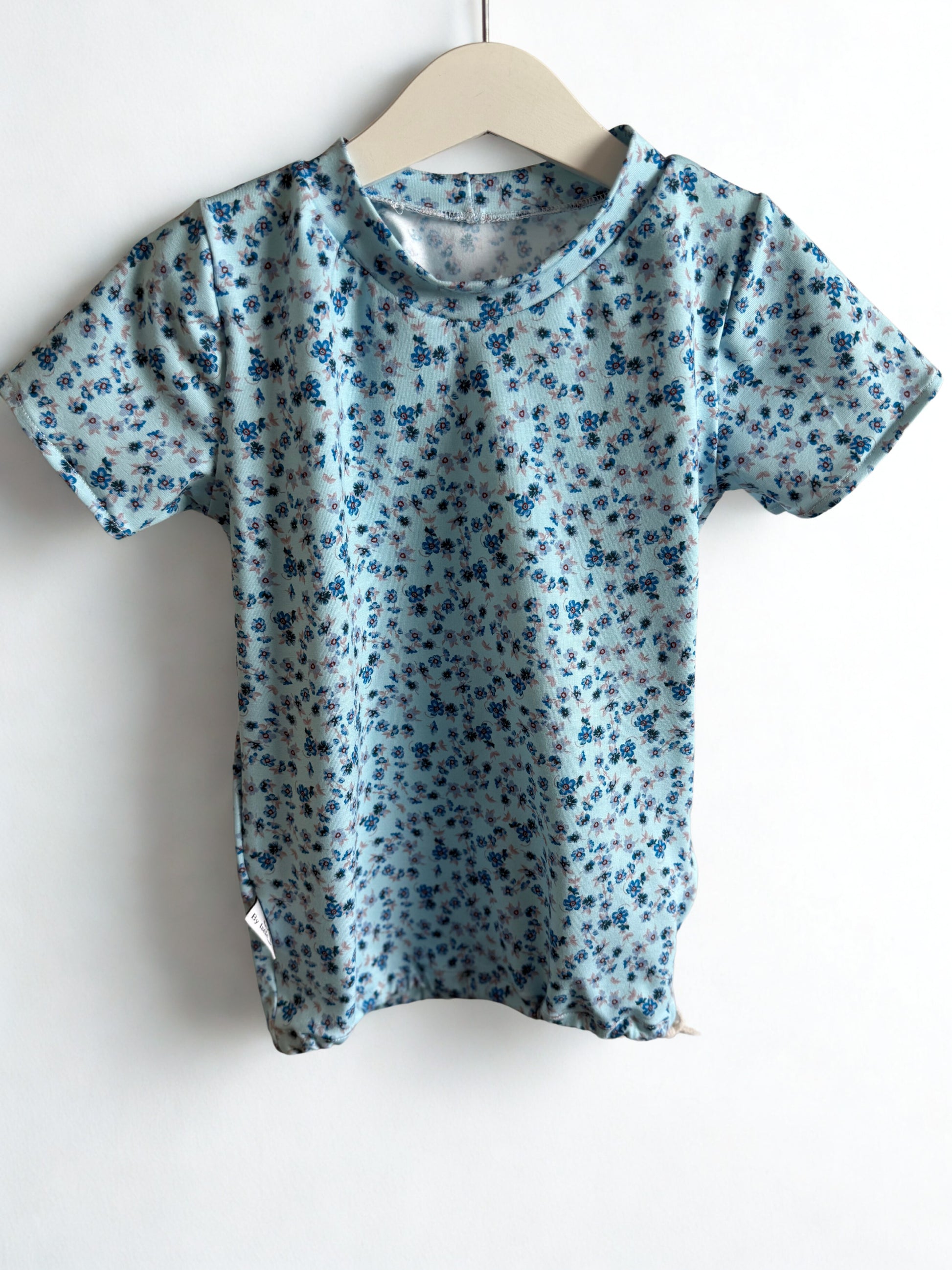 shirt blauwe bloem met trekkoord